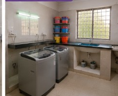 Hostel laundry room with washing machines